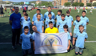 بعثة أشبال المدرسة الكروية التابعة للمركز الجماهيري تعود من برشلونة الى القرية